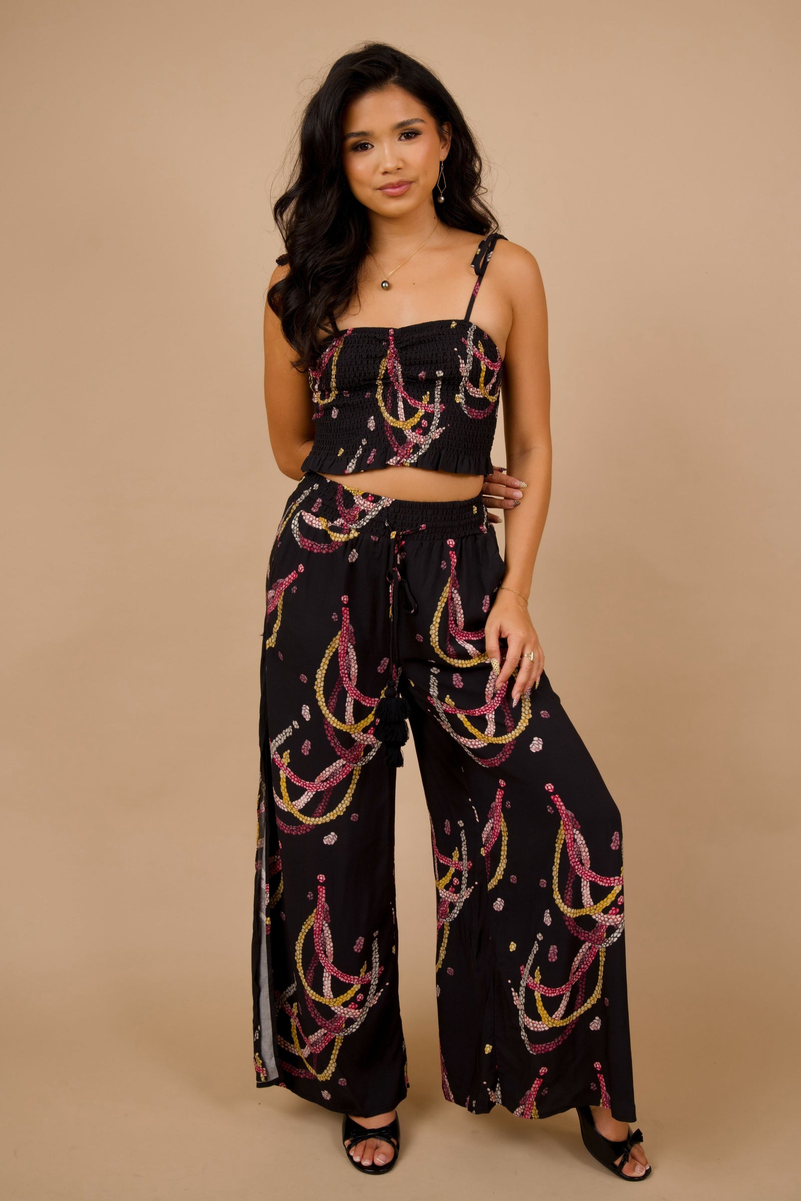 Women's Malama Pants in Black Lei Kahelelani - Front View | Kahulaleʻa