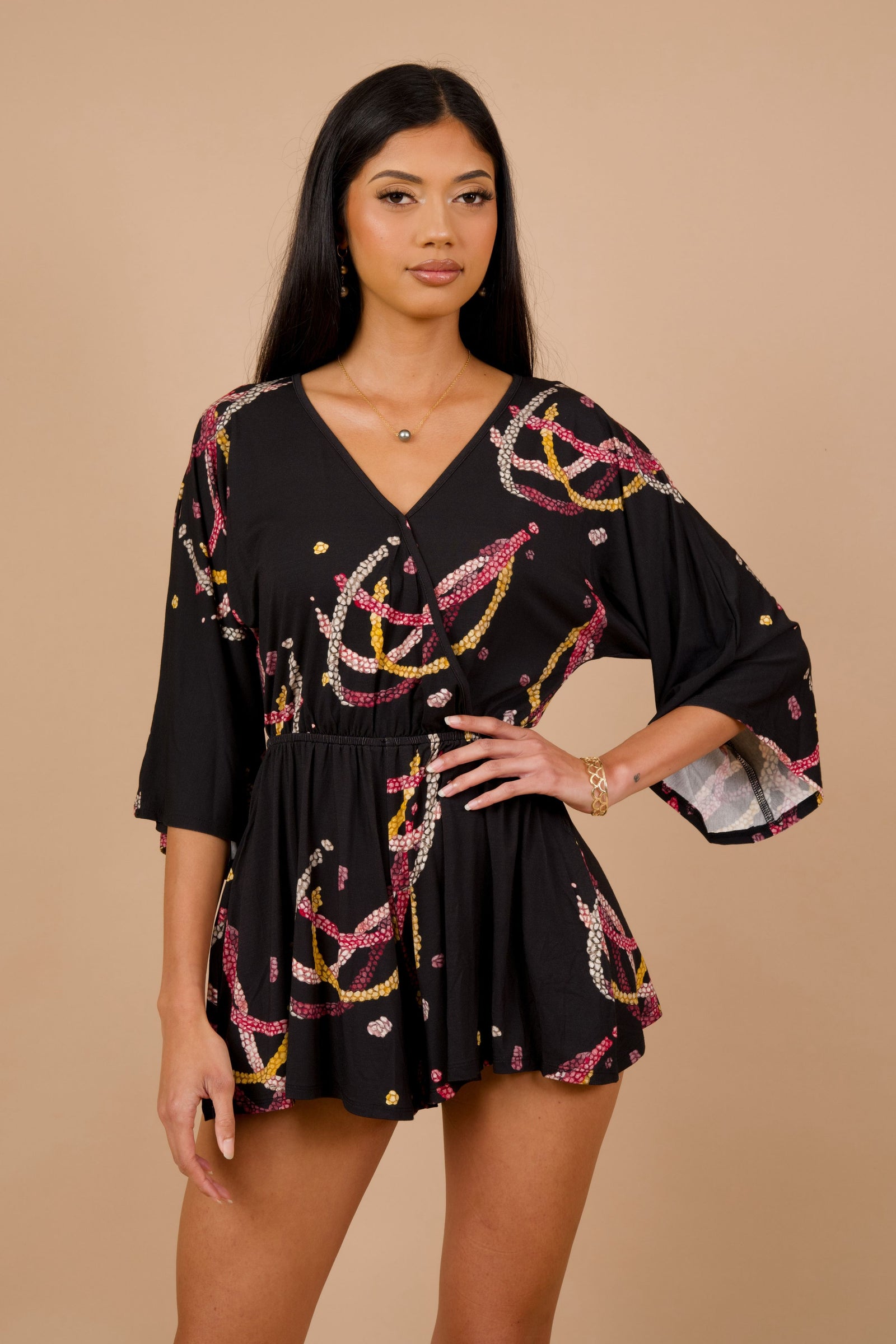 Women's Nahiku Romper in Black Lei Kahelelani - Front View | Kahulaleʻa