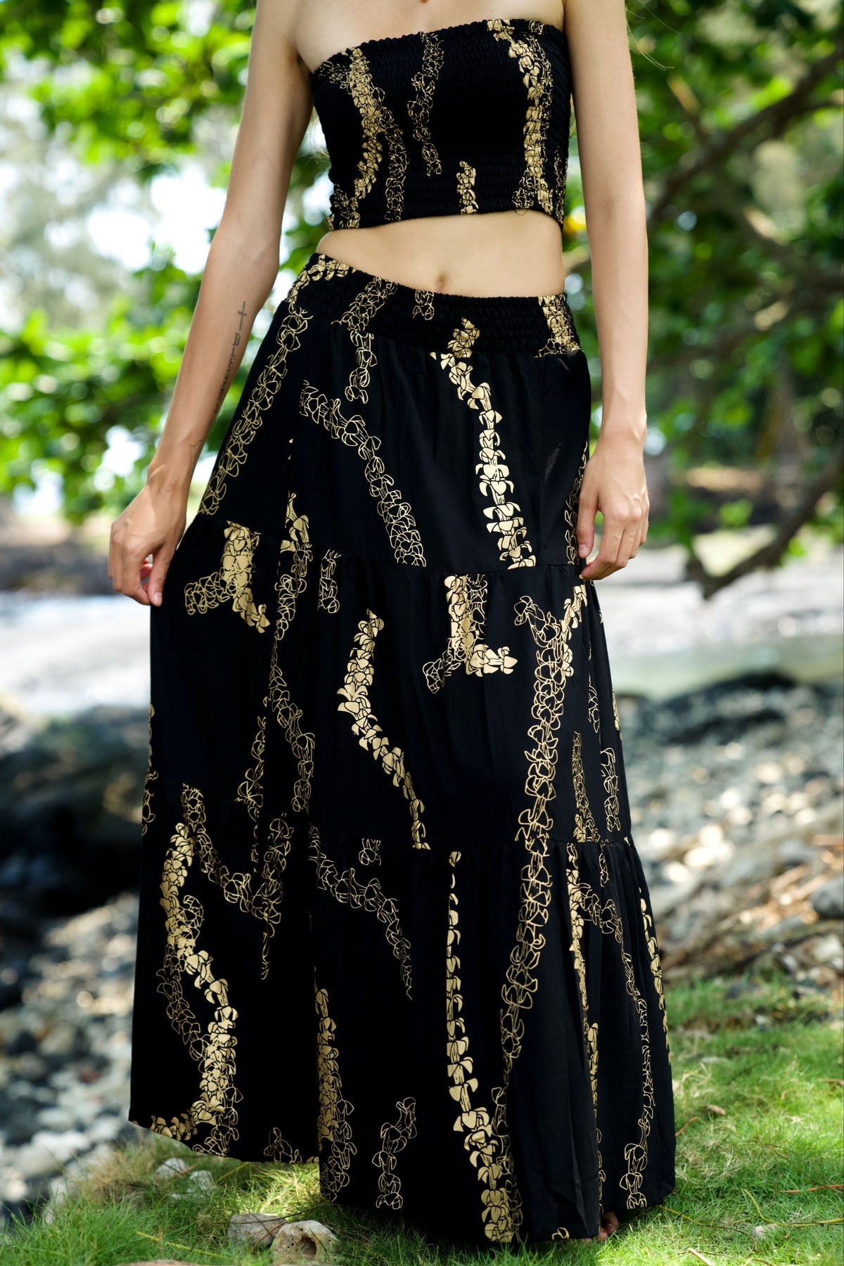 Women's Mahina Tiered Skirt & Smocked Bandeau Lelia Top in Black & Gold Lei Puakenikeni - Front View | Kahulaleʻa