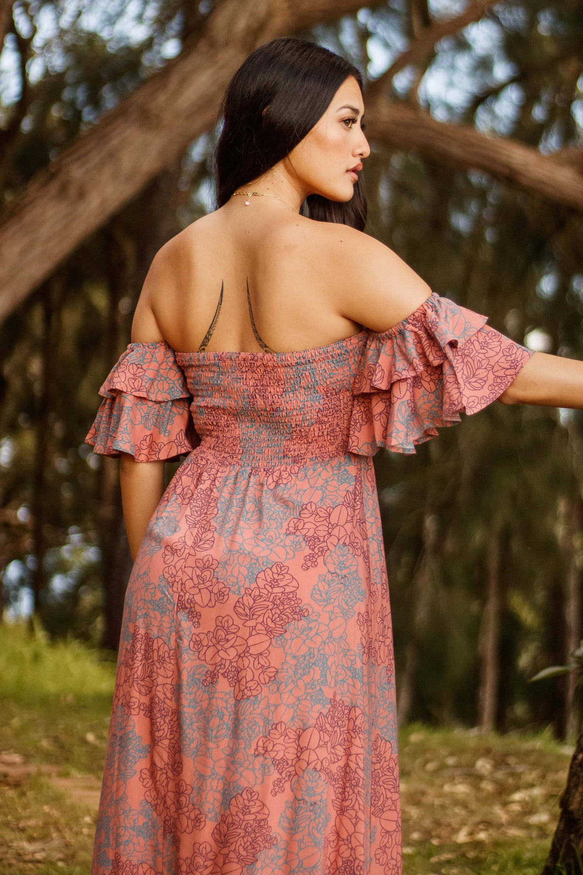 Dress Hoʻolai in Coral Tide Liko — Back View, sleeves off the shoulder | Kahulaleʻa
