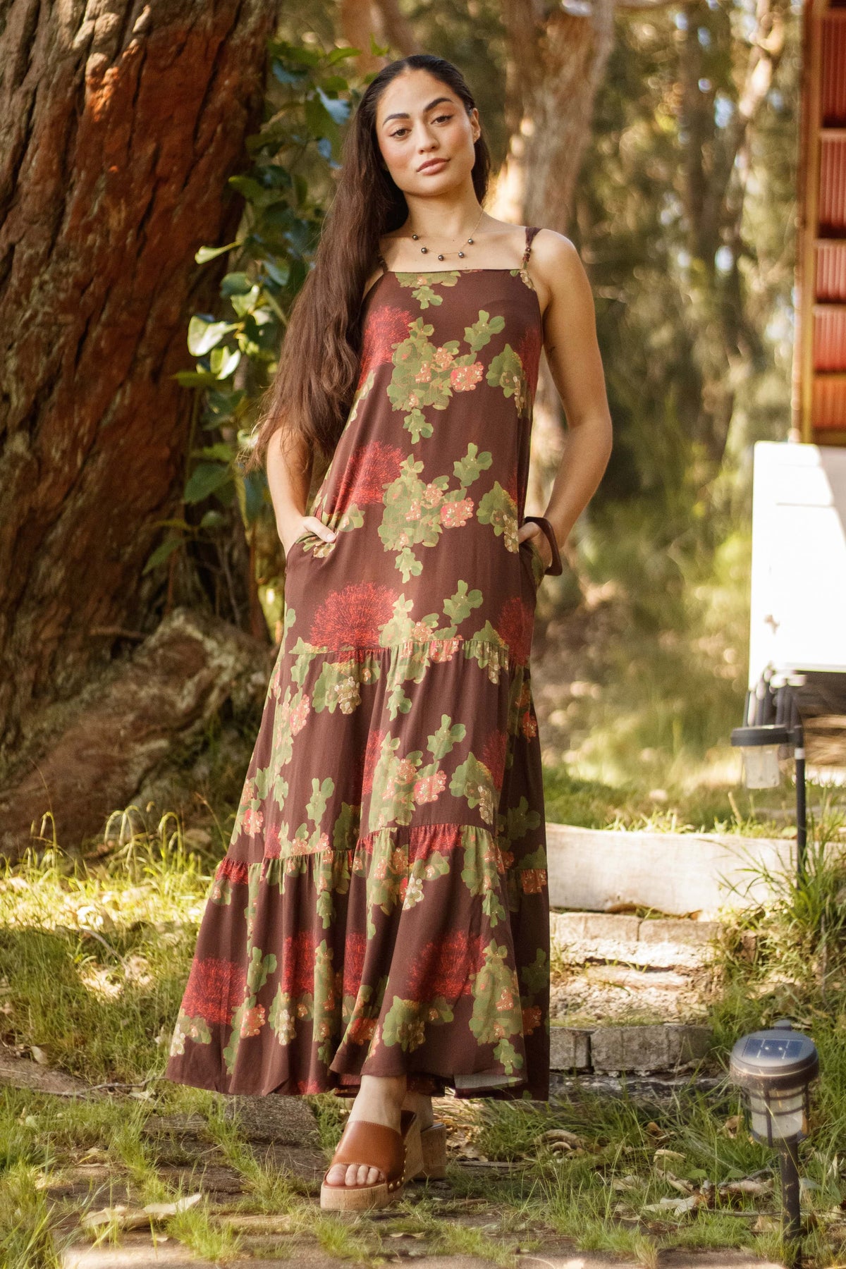 Dress Kalaeloa in Mocha Lehua Blossom — Front View, hands in pockets | Kahulaleʻa