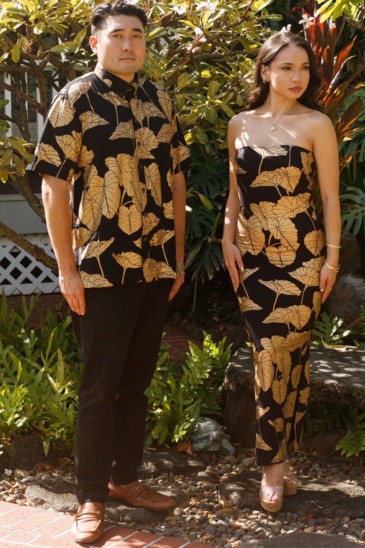 Men's Aloha Shirt in Black Gold Lauloa Keʻokeʻo Kalo — On-Model, with the Dress Leimakamae | Kahulaleʻa