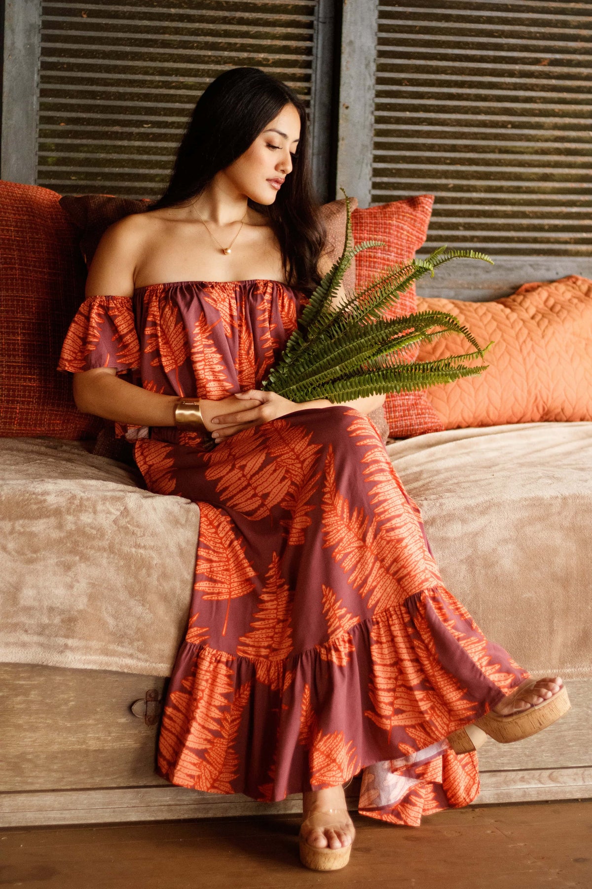 Skirt Nainoa in Ember Glow Kupukupu — On-Model, seated, worn with the Top Nainoa | Kahulaleʻa