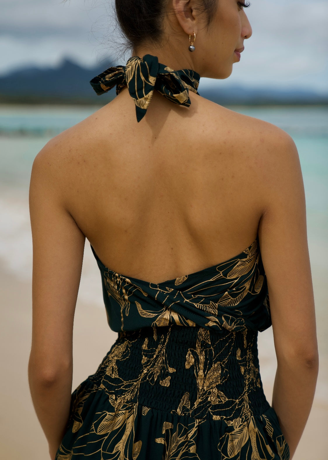 Women's High Neck Maxi Dress in Black Gold Ti Leaf - Back View | Kahulaleʻa