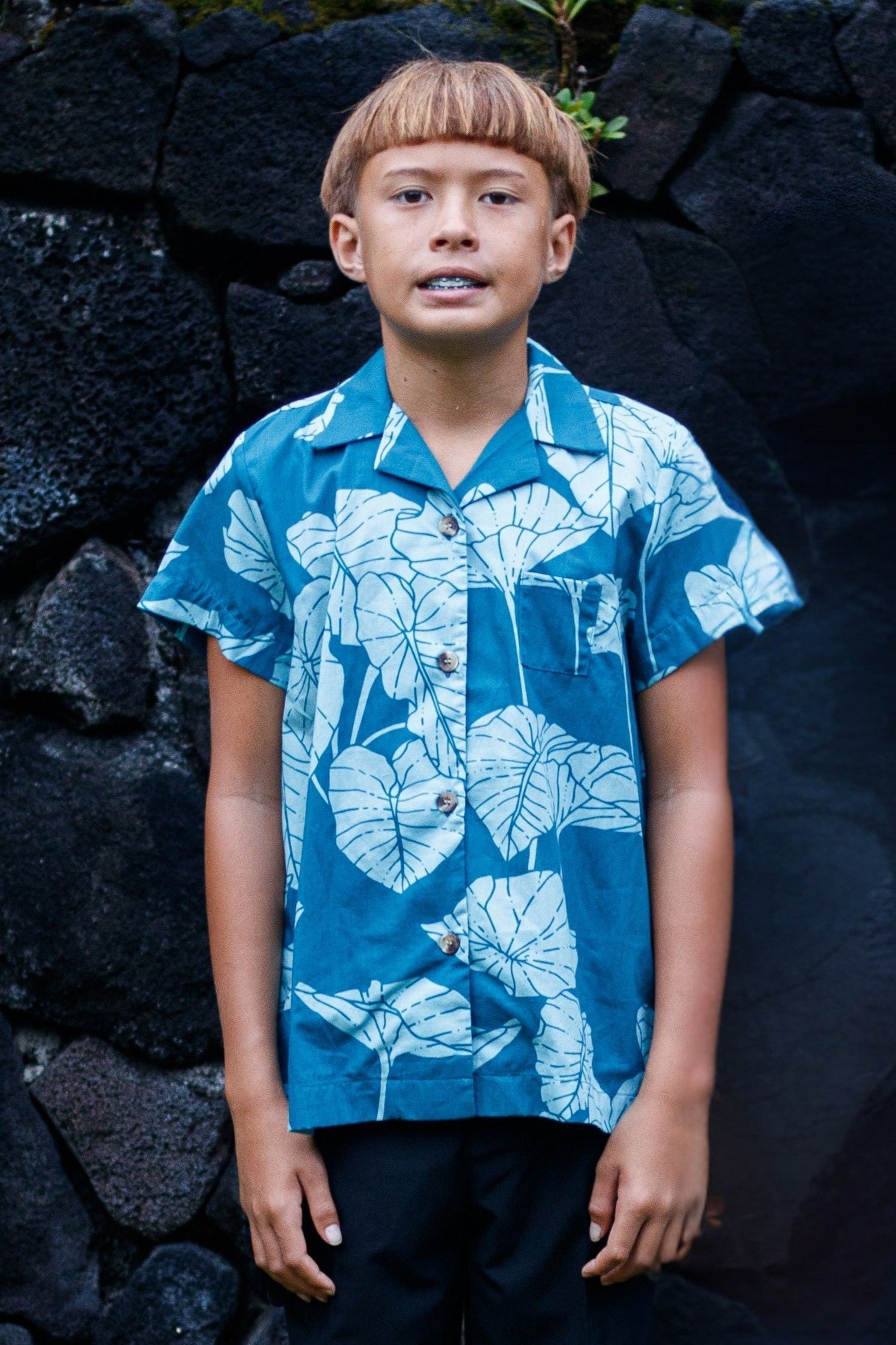 Boys Aloha Shirt in Marina Keʻokeʻo Kalo — Front View On-Model | Kahulaleʻa