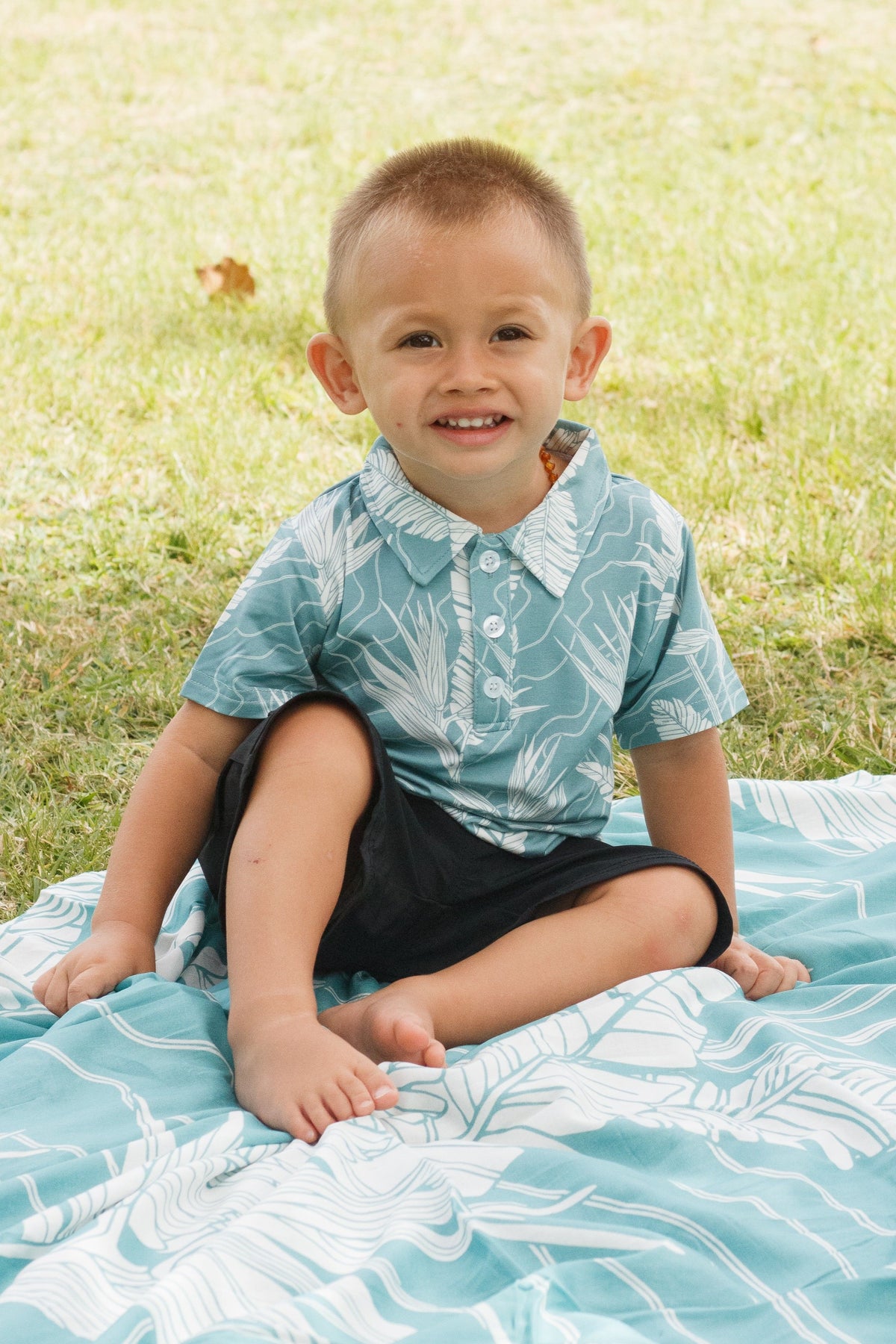 Boys Polo in Sky Pua Manu — Front View | Kahulaleʻa