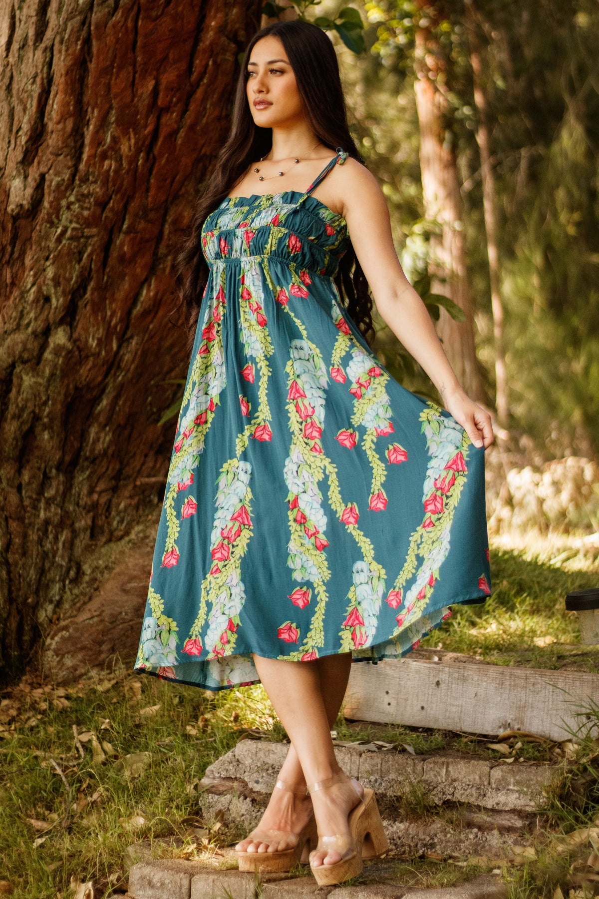 Dress Wainui in Blue Lei Kaʻiʻini — Side View, skirt held out | Kahulaleʻa