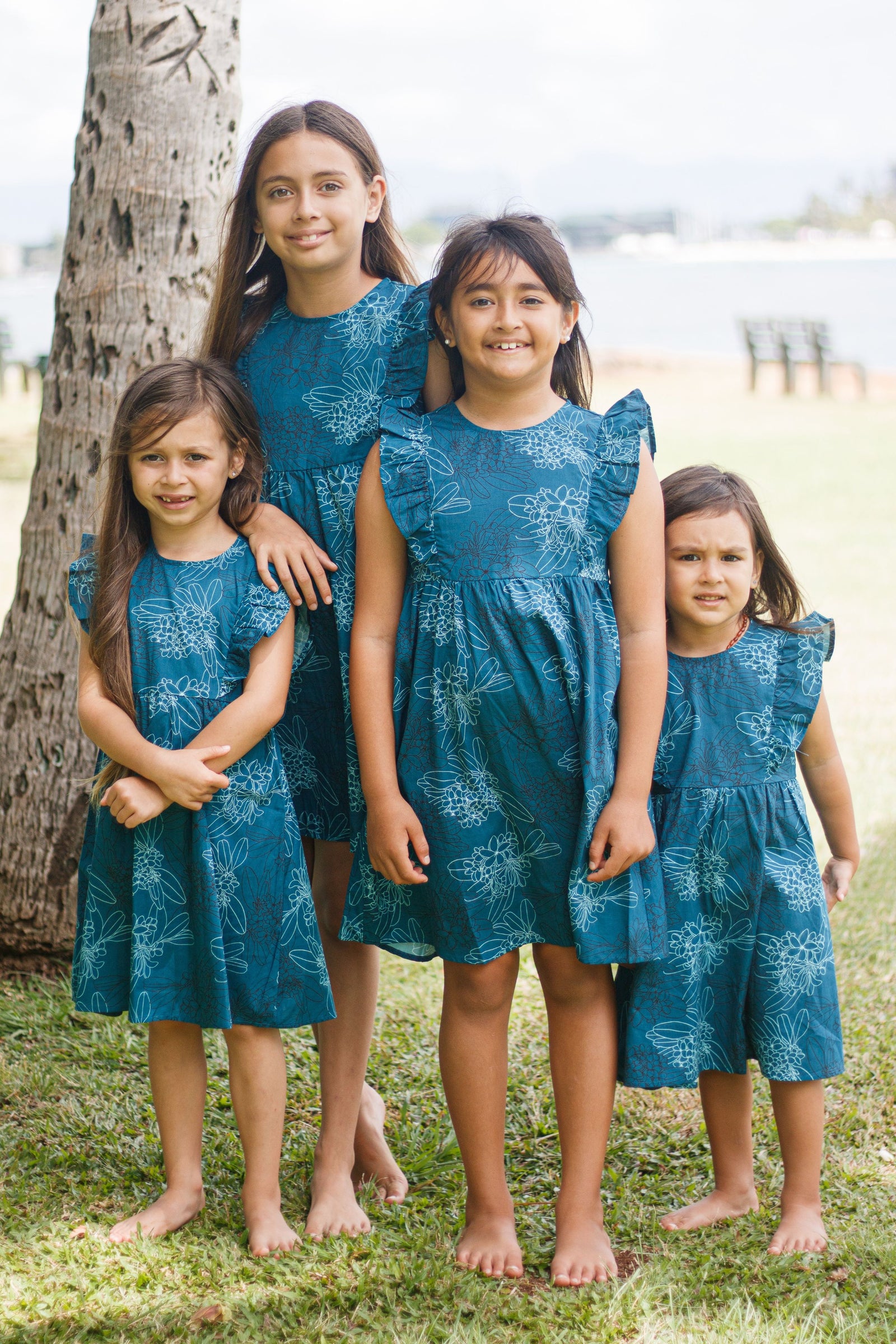 Four young Girls in matching Dress Maila Teal Pua Melia