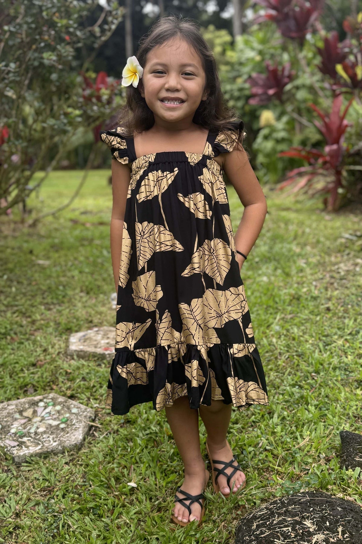 Girl's Dress in Black Gold Kalo — Front View, full length | Kahulaleʻa
