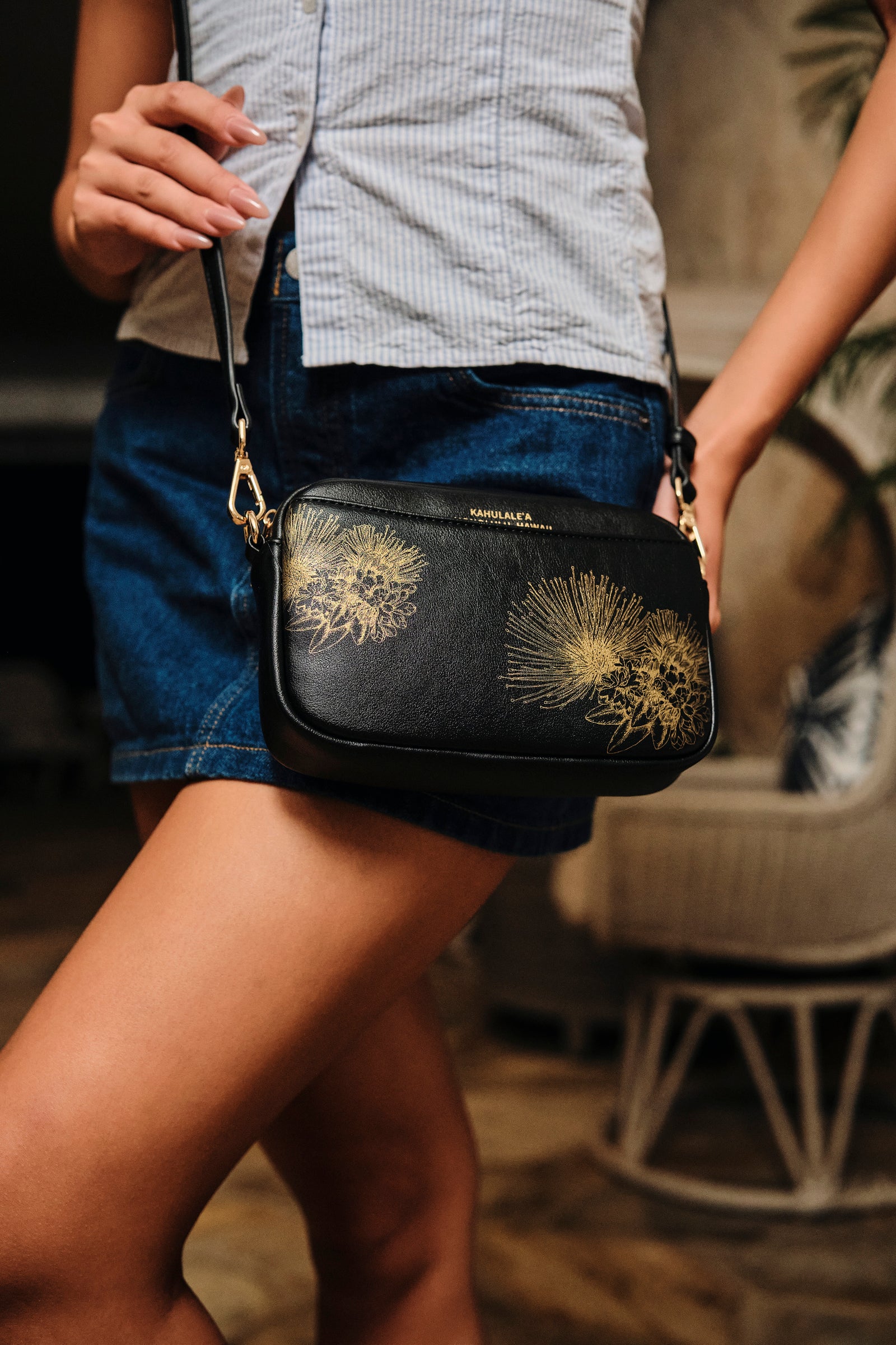 Front view of the black Crossbody Bag in the Lehua print by Kahulale'a
