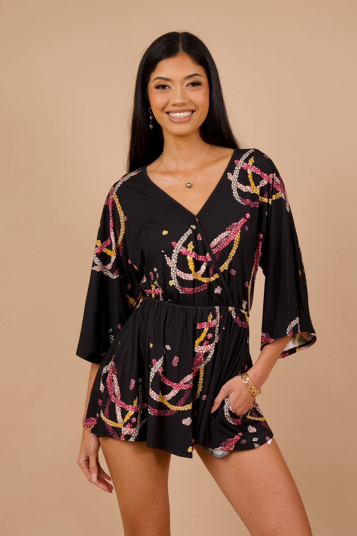 Women's Nahiku Romper in Black Lei Kahelelani - Front View | Kahulaleʻa