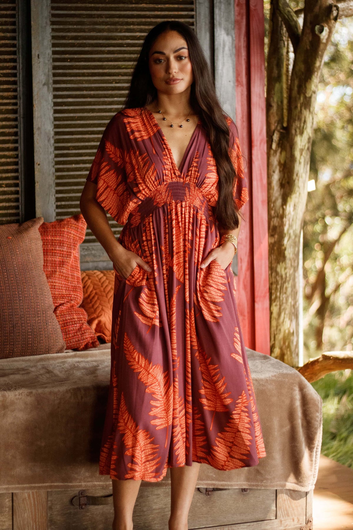 Dress Kamaile in Ember Glow Kupukupu — Front View, hands in pockets | Kahulaleʻa
